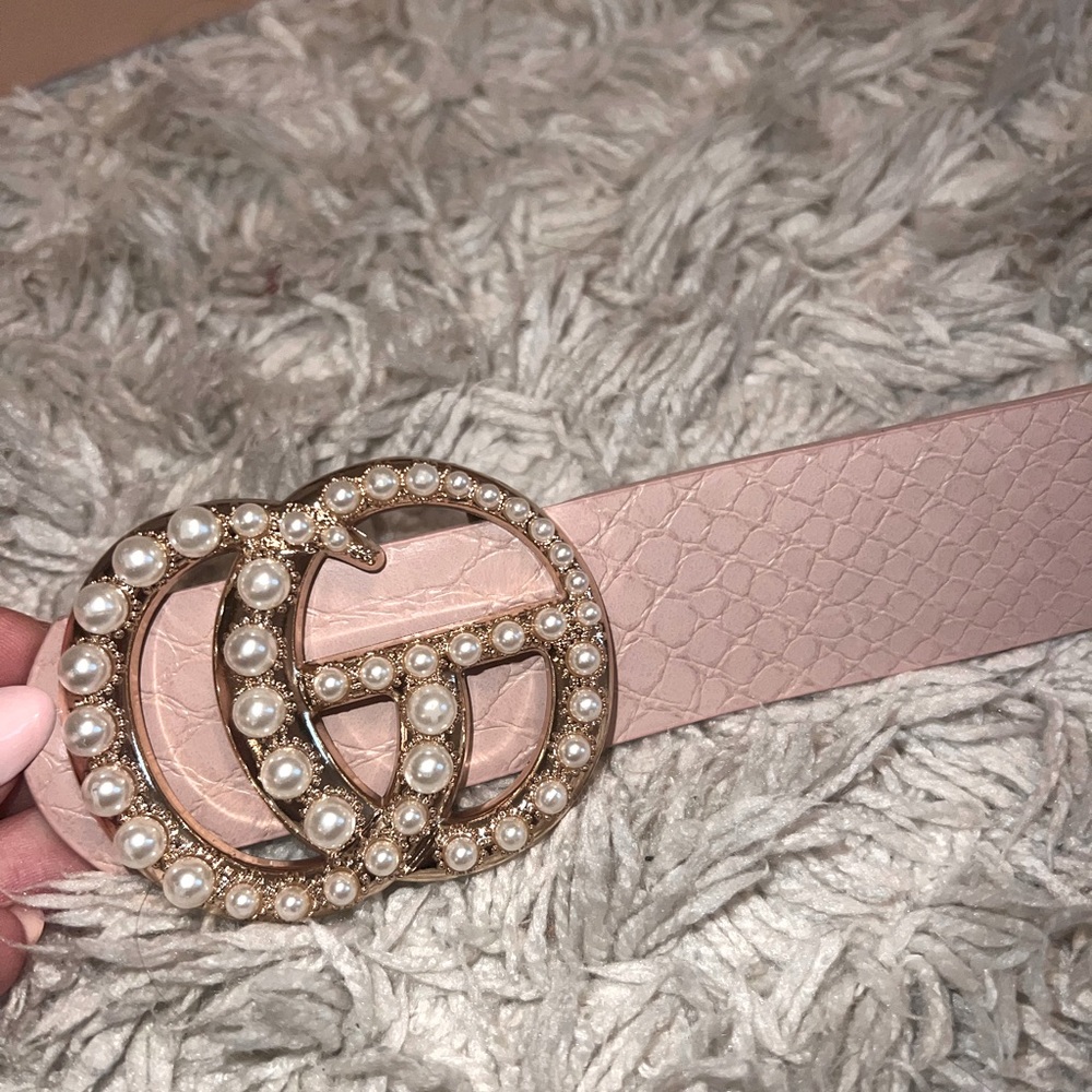 light pink boutique belt with gold and pearl hardware